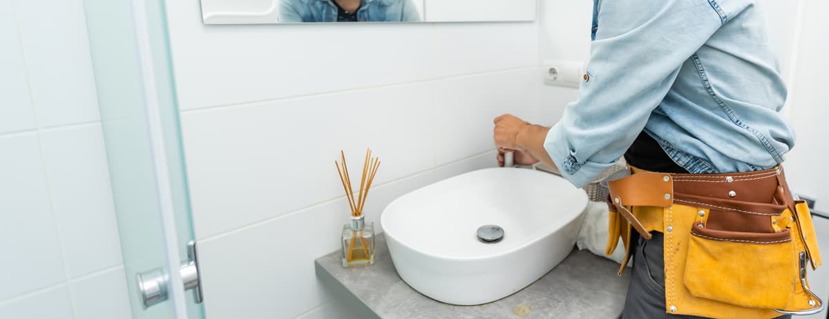 Luxury bathroom installation with expert basin faucet and plumbing repair
